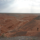 A Mongolian researcher leads the group down the Flaming Cliffs, the same region where Roy Chapman Andrews first found a nest of dinosaur eggs.